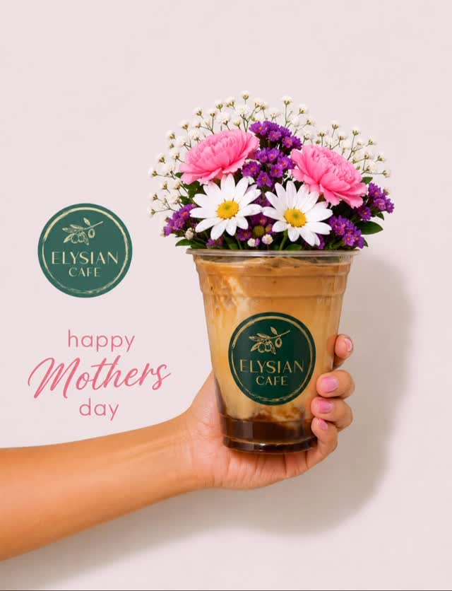 An Elysian Cafe iced coffee topped with fresh spring flowers